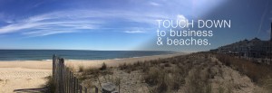 beach with dunes ocean and properties along coast
